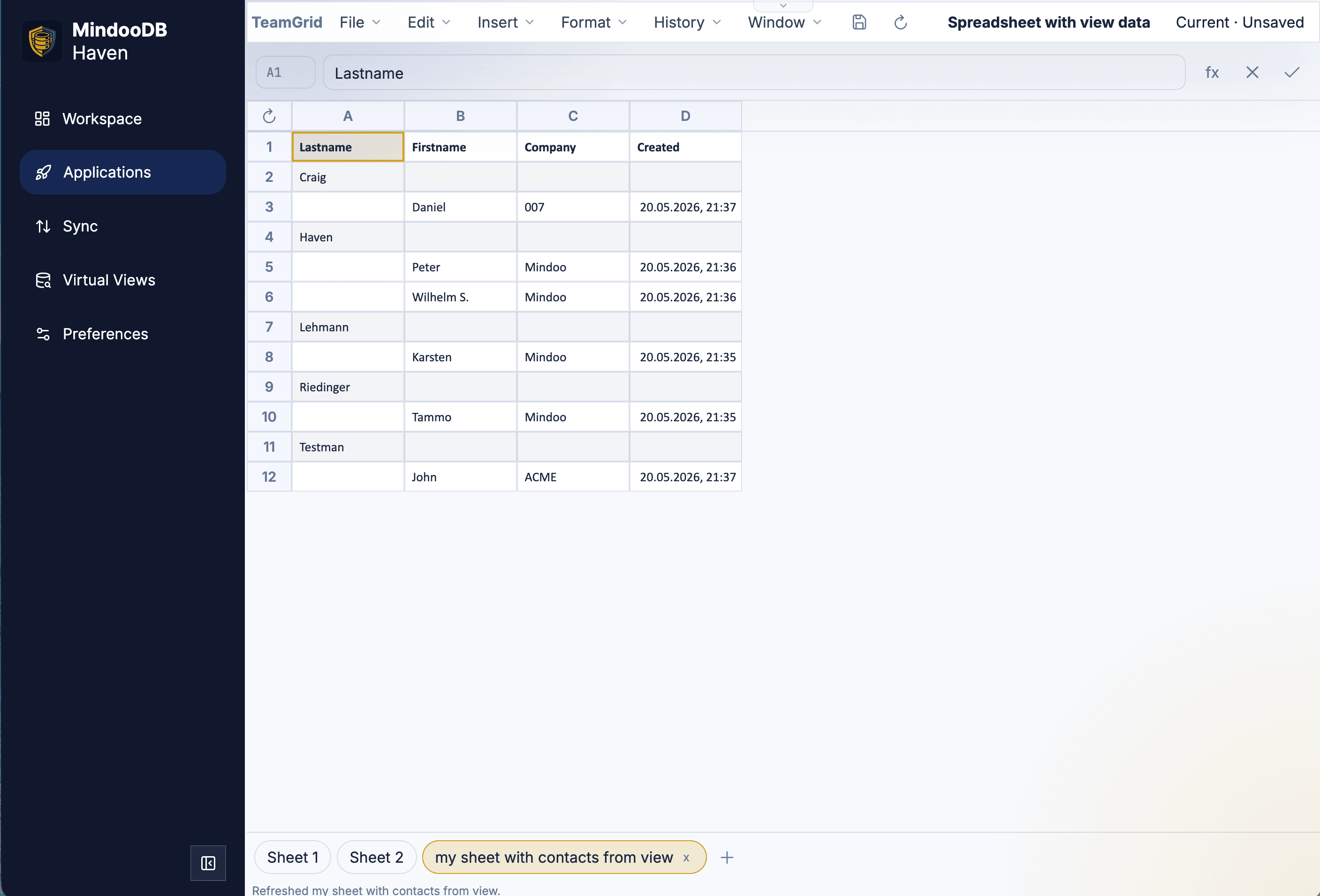 Mindoo TeamGrid Virtual View Sheet titled 'my sheet with contacts from view' showing Lastname, Firstname, Company, and Created columns populated from a Haven Virtual View, with category rows for Craig, Haven, Lehmann, Riedinger, and Testman and a Refresh button above the row numbers
